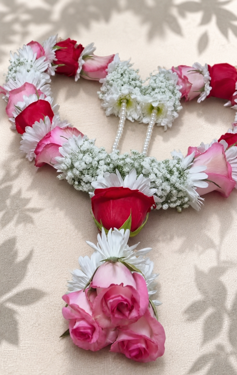 Natural blush and ruby rose garland with white daisies
