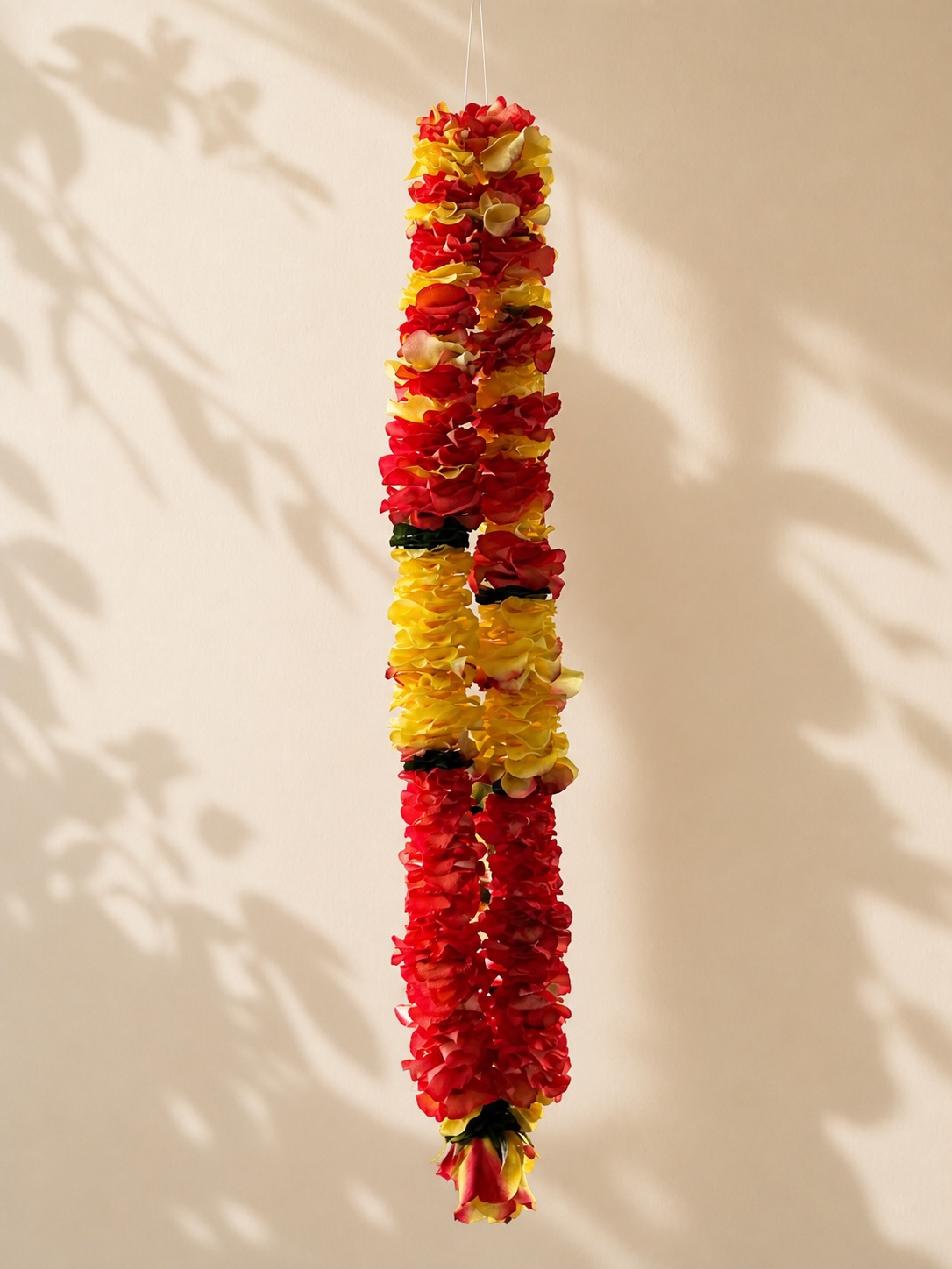 Red and yellow rose petal garland detail product view