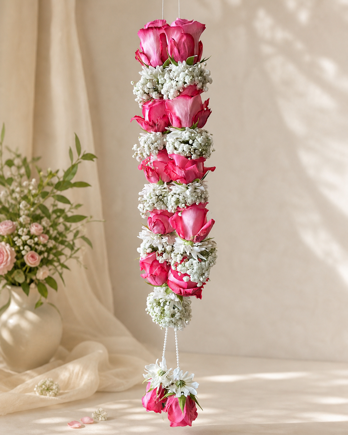 Blush rose hanging mala with white flowers