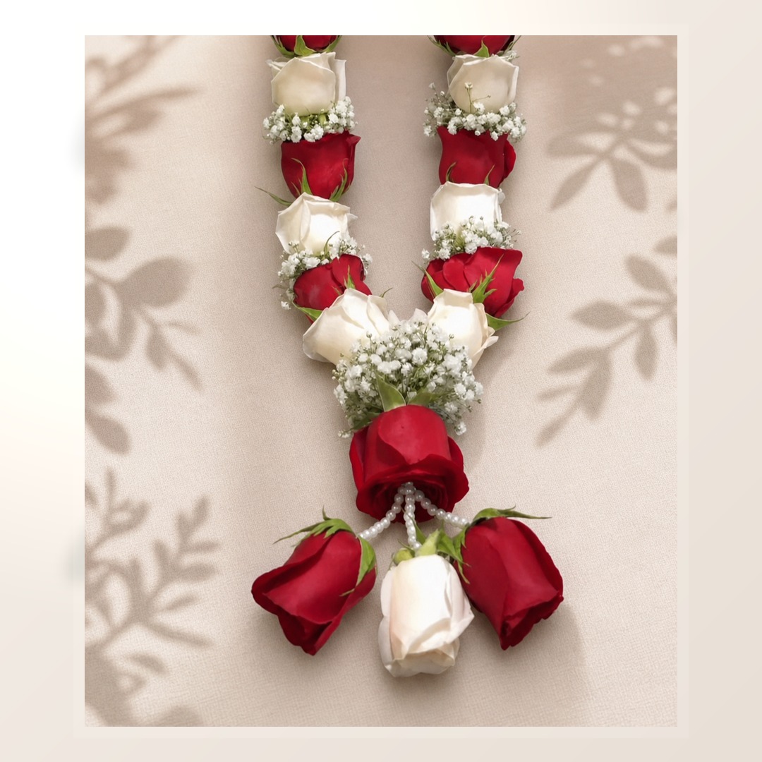 Handcrafted ruby red and ivory rose mala with baby's breath