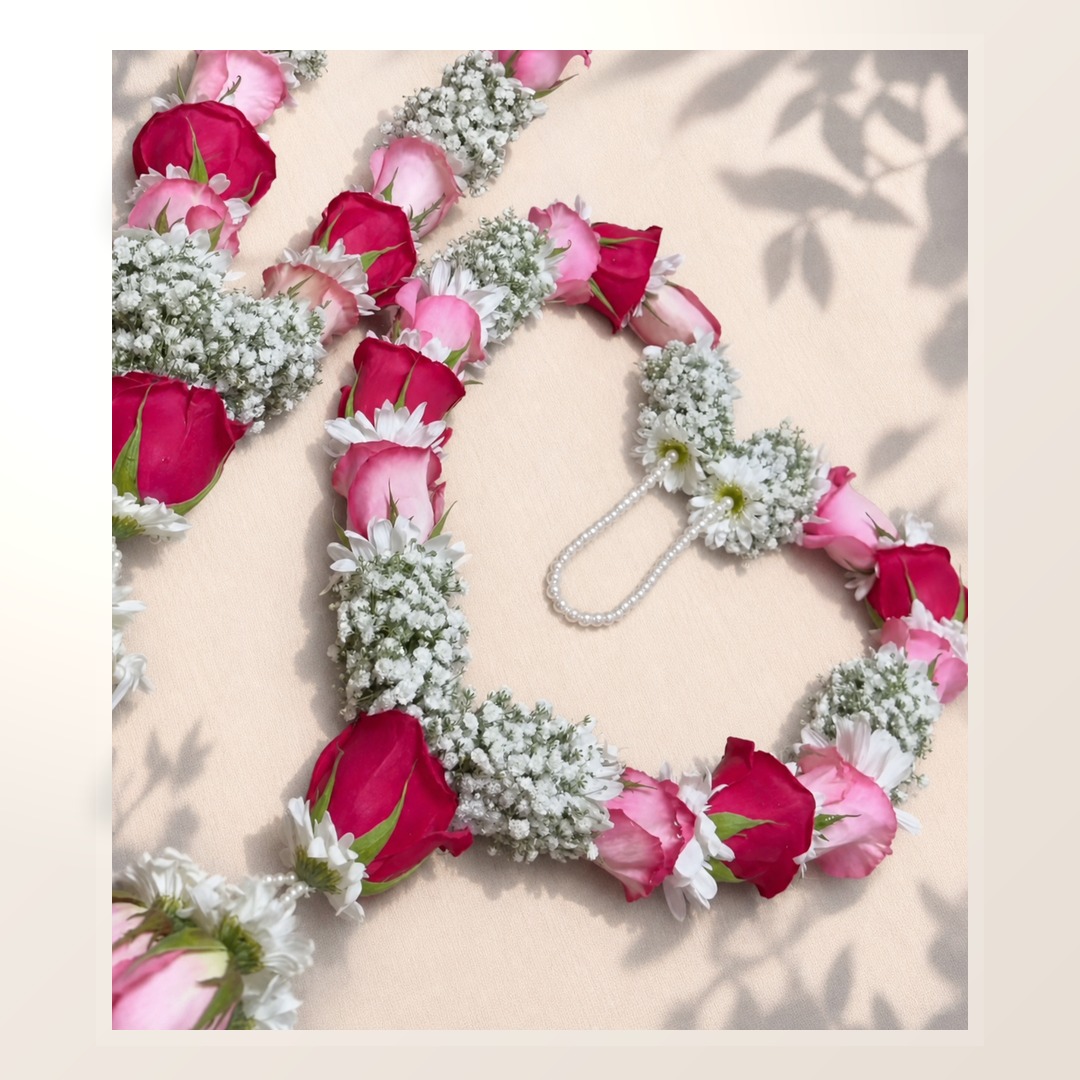 Blush and ruby rose garland with baby's breath and pearl loop