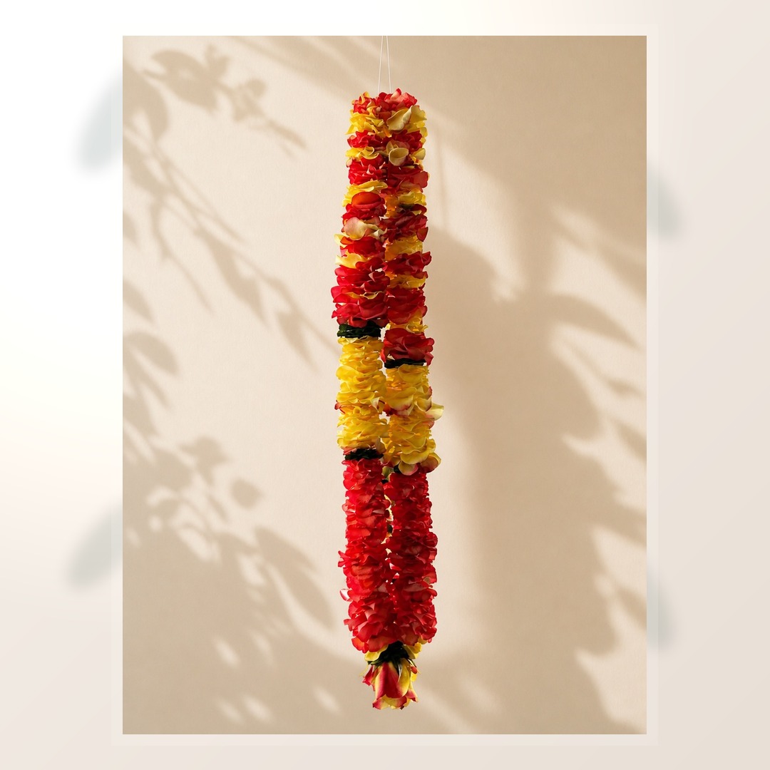 Red and yellow rose petal garland detail product view