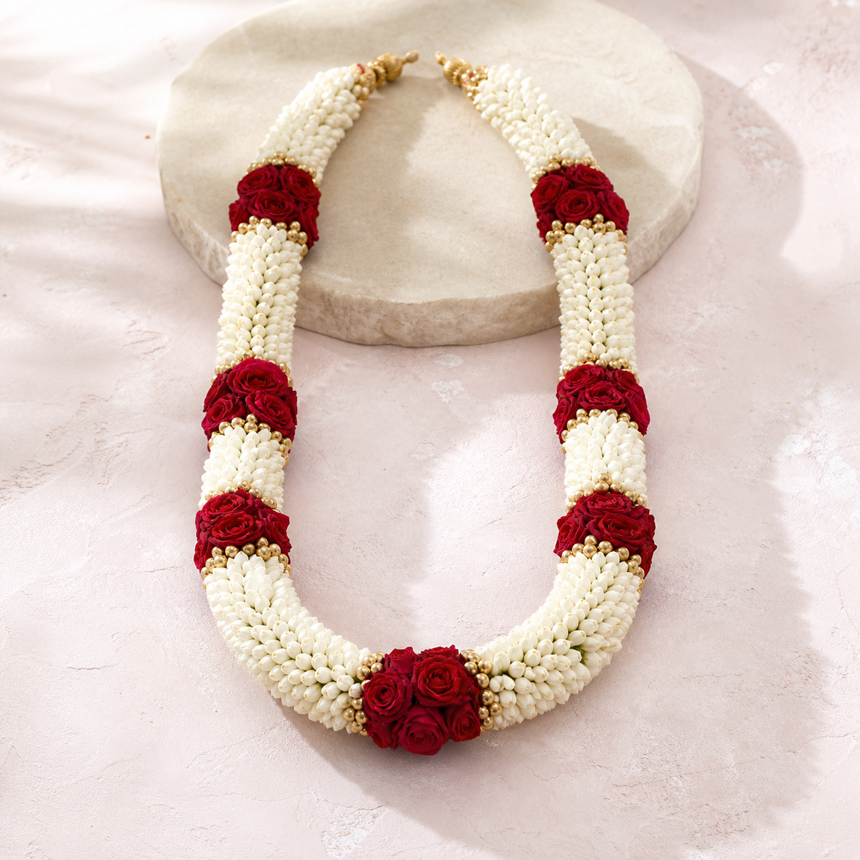 Red rose and jasmine wedding garland